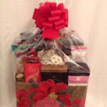 A delightful Holiday Greetings gift basket adorned with a beautiful poinsettia, perfect for corporate clients during the Christmas season.