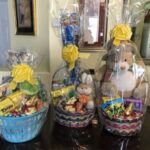 Three easter baskets sitting on a table.