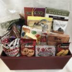 A gift basket with a variety of snacks and chocolates.